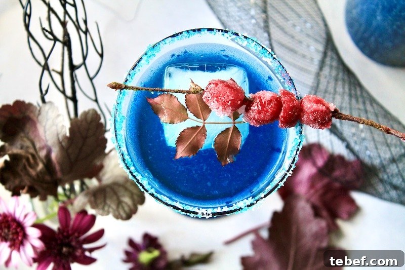gather light rum, lemon,  apple cranberry juice simple syrup prosecco and blue curacao