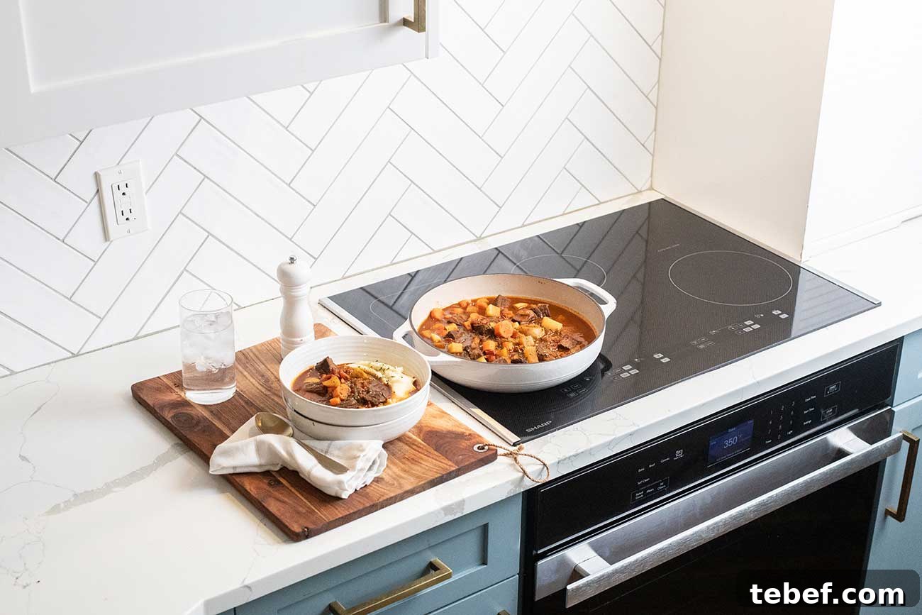 Moroccan Beef Tagine Recipe: Traditional Slow-Cooked Stew 3 A pot of beef tagine sitting on the Sharp Induction Cooktop.