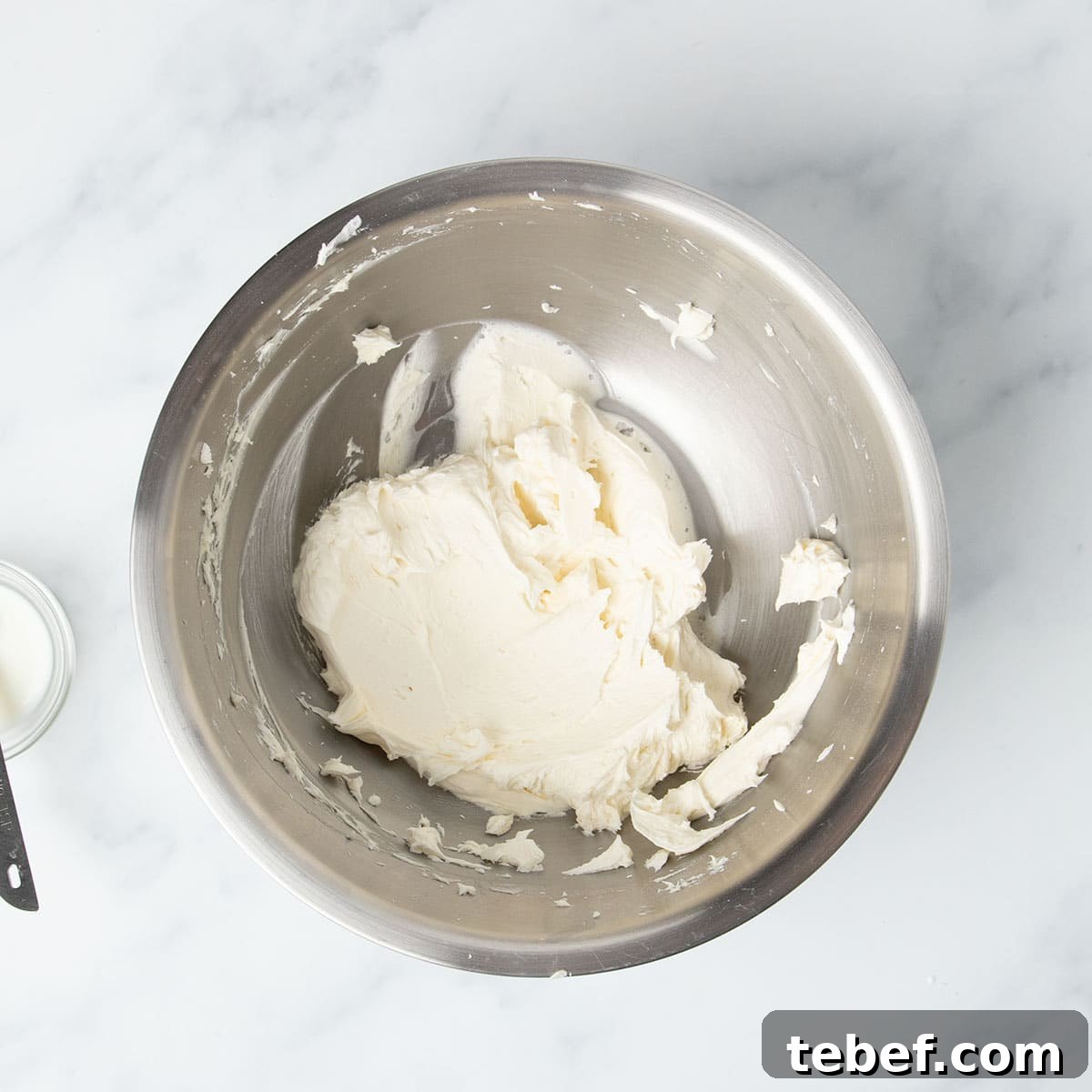 Gluten-Free Vanilla Cupcakes Recipe for Moist, Fluffy Results 22 white whipped buttercream frosting in same bowl