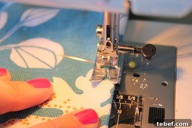 sewing machine sewing fabric