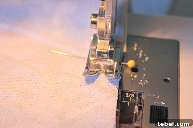 sewing machine stitching fabric