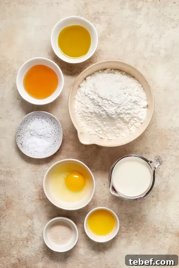 Dinner roll ingredients in small bowls.