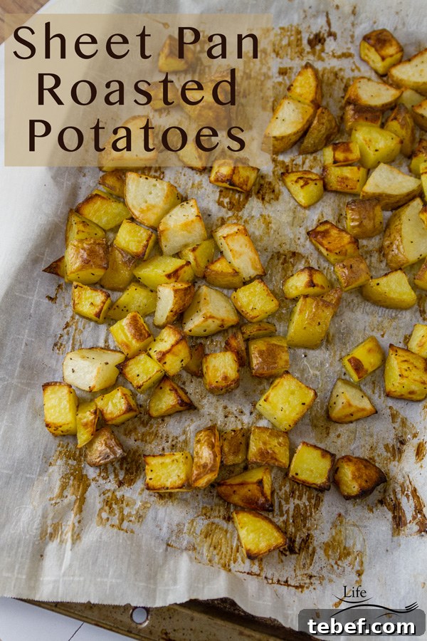 Sheet Pan Roasted Potatoes are an easy, delicious side dish for any meal. This super easy method produces perfectly cooked potatoes that are crispy outside and tender and creamy inside. Sheet Pan Roasted Potatoes on parchment paper on a sheet pan with the title