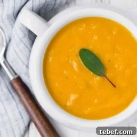 Butternut squash soup topped with sage.