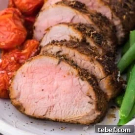 Sliced spice-rubbed pork tenderloin.
