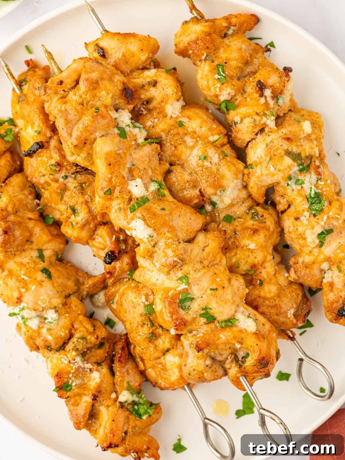 Juicy Oven-Baked Chicken Skewers: Simple Weeknight Recipe 10 Oven chicken skewers on plate.