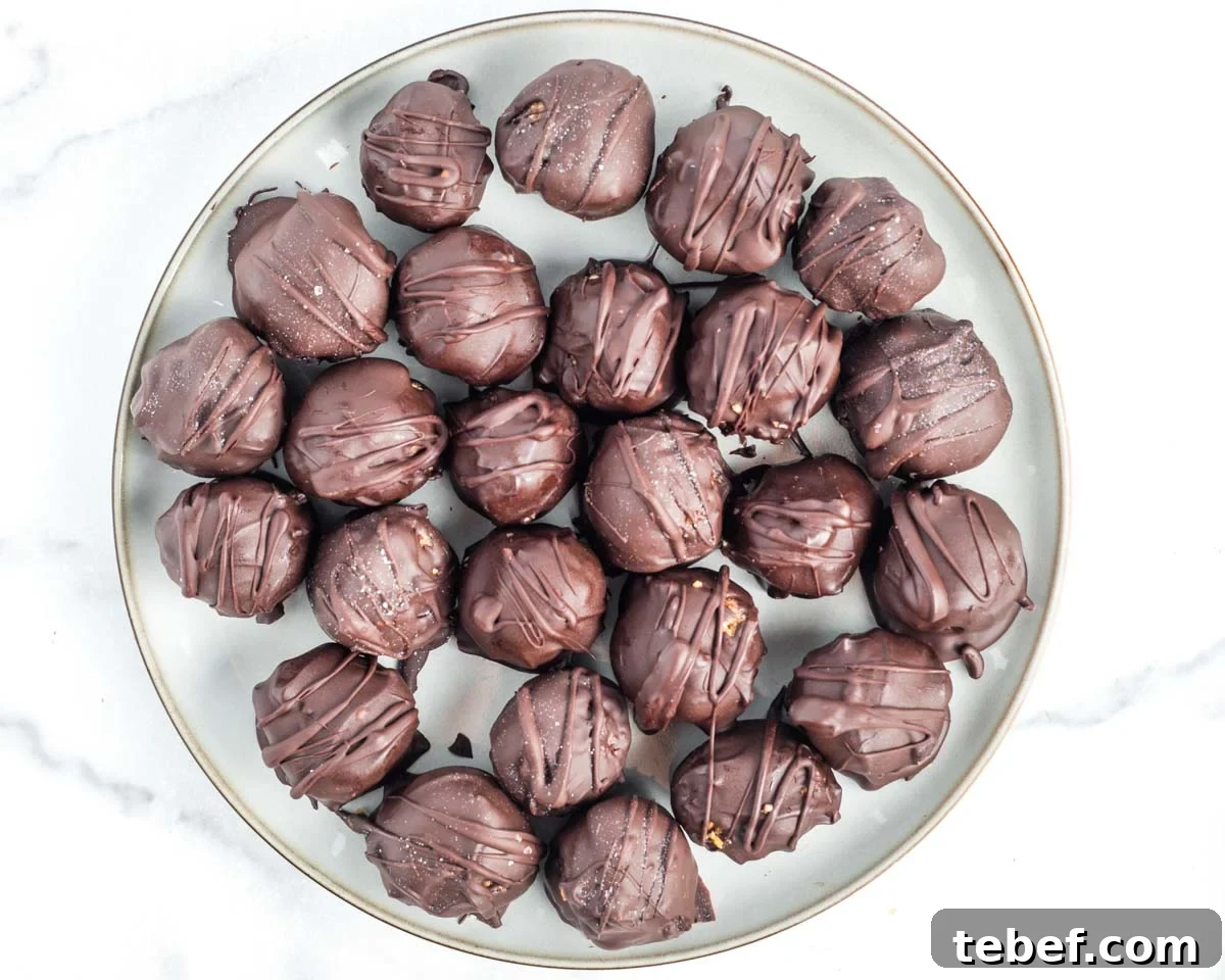 Chocolate-Dipped Matzo Crack Balls: Crispy Sweet Snack Recipe 12 Matzo crack balls dipped in chocolate and drizzled with more chocolate.