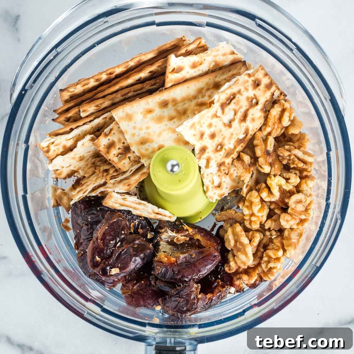 Chocolate-Dipped Matzo Crack Balls: Crispy Sweet Snack Recipe 4 Food processor bowl with matzo, dates and walnuts