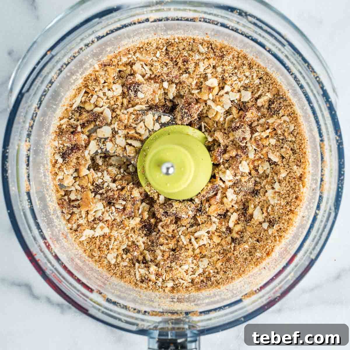 Chocolate-Dipped Matzo Crack Balls: Crispy Sweet Snack Recipe 5 Crumbly mixture in a food processor bowl of matzo, nuts and dates.