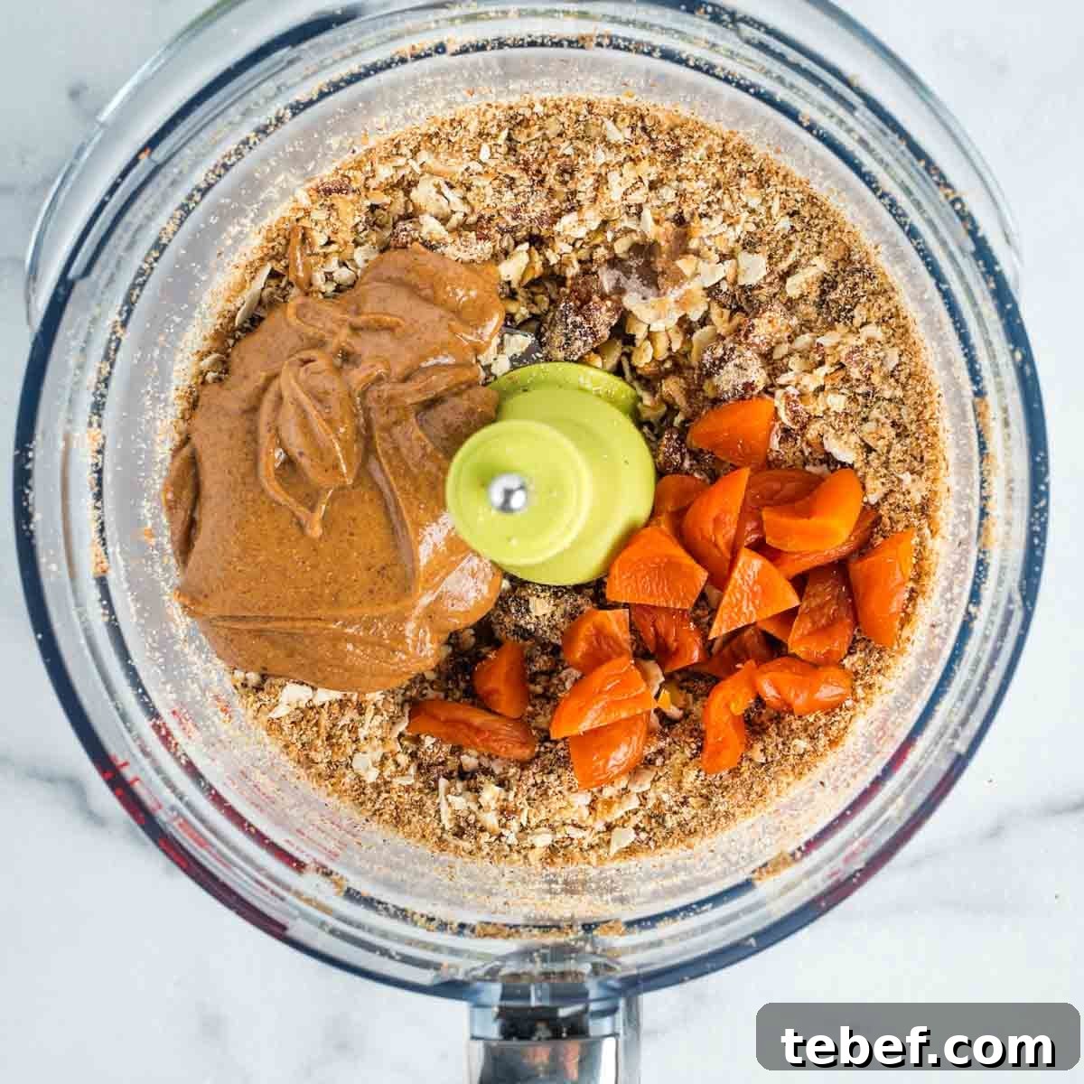Chocolate-Dipped Matzo Crack Balls: Crispy Sweet Snack Recipe 6 Crumbly matzo mixture plus almond butter and dried apricots in a food processor.