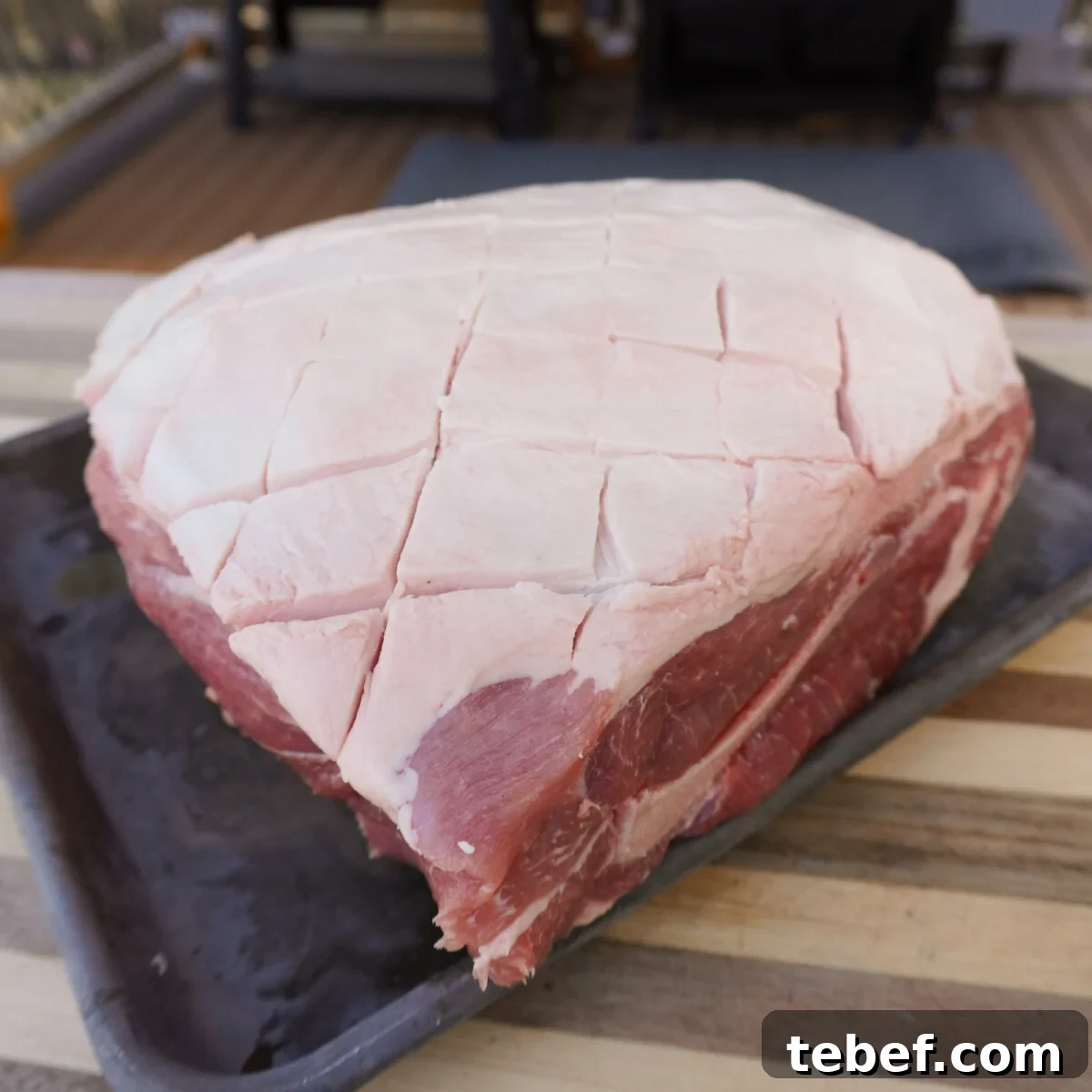 Perfect Slow-Cooker Pulled Pork Sandwich Recipe 5 Scoring the fat cap on a pork shoulder.