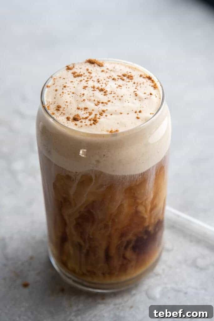 Cream swirls in coffee