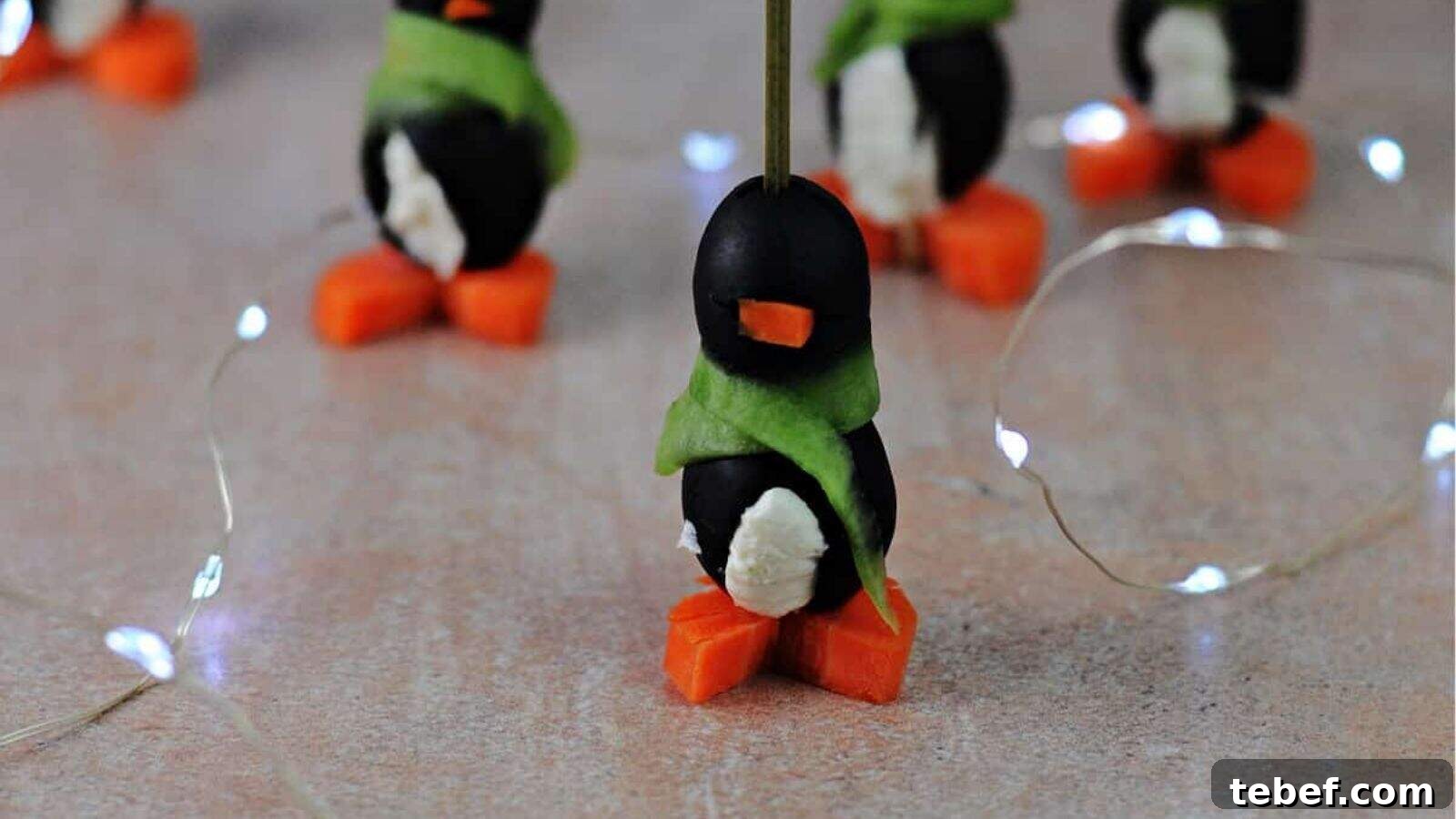 22 Festive Holiday Party Appetizers to Delight Your Guests 2 Cream Cheese Penguins