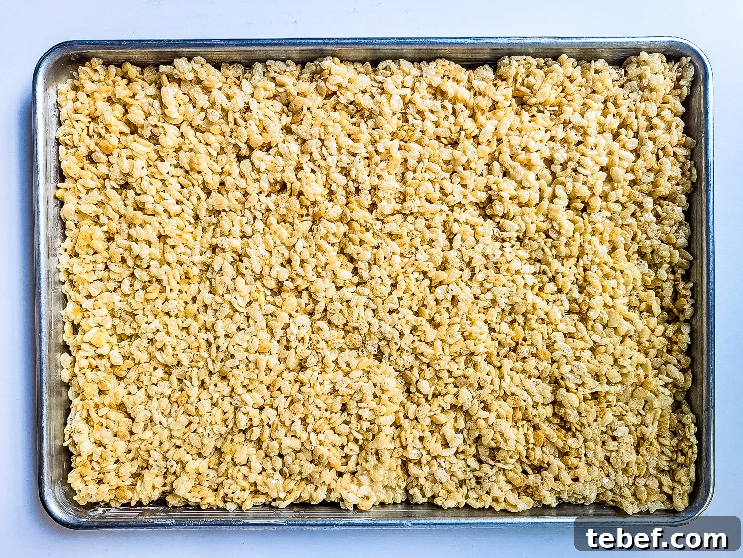Rice Krispie Christmas Trees: Festive Holiday Treat Idea 7 sheet pan with rice Krispy cereal