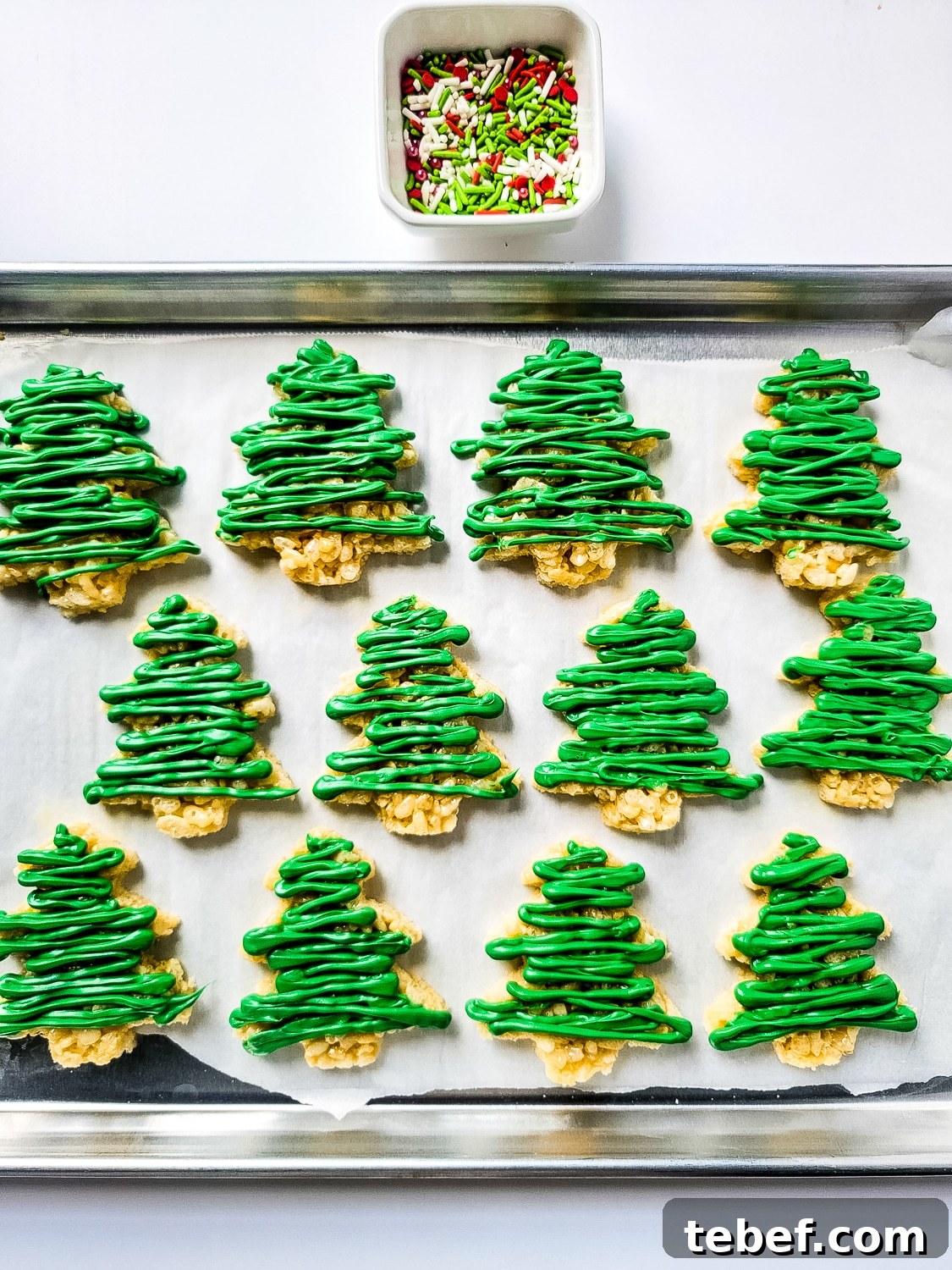 Rice Krispie Christmas Trees: Festive Holiday Treat Idea 9 christmas tree shaped Rice Krispies with icing