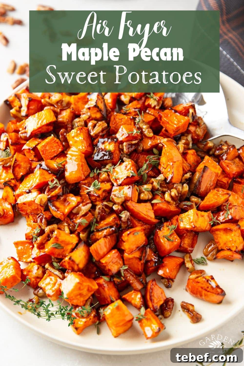 Maple Pecan Sweet Potatoes in the Air Fryer: Crispy & Caramelized 15 Cooked maple sweet potatoes with pecans and fresh thyme, silver spoon, plaid cloth.