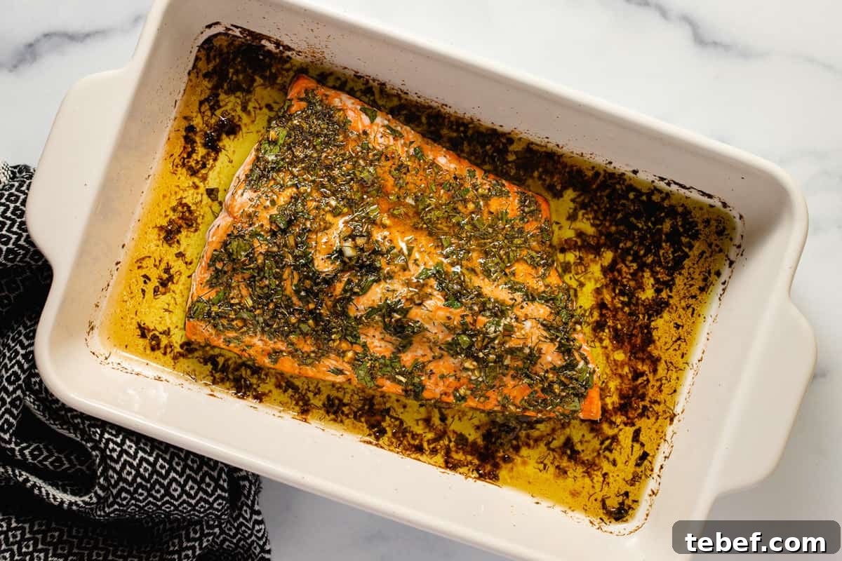 Greek Salmon Bowl Recipe with Lemon-Dill Yogurt Dressing 5 Large baking dish filled with freshly baked Greek salmon