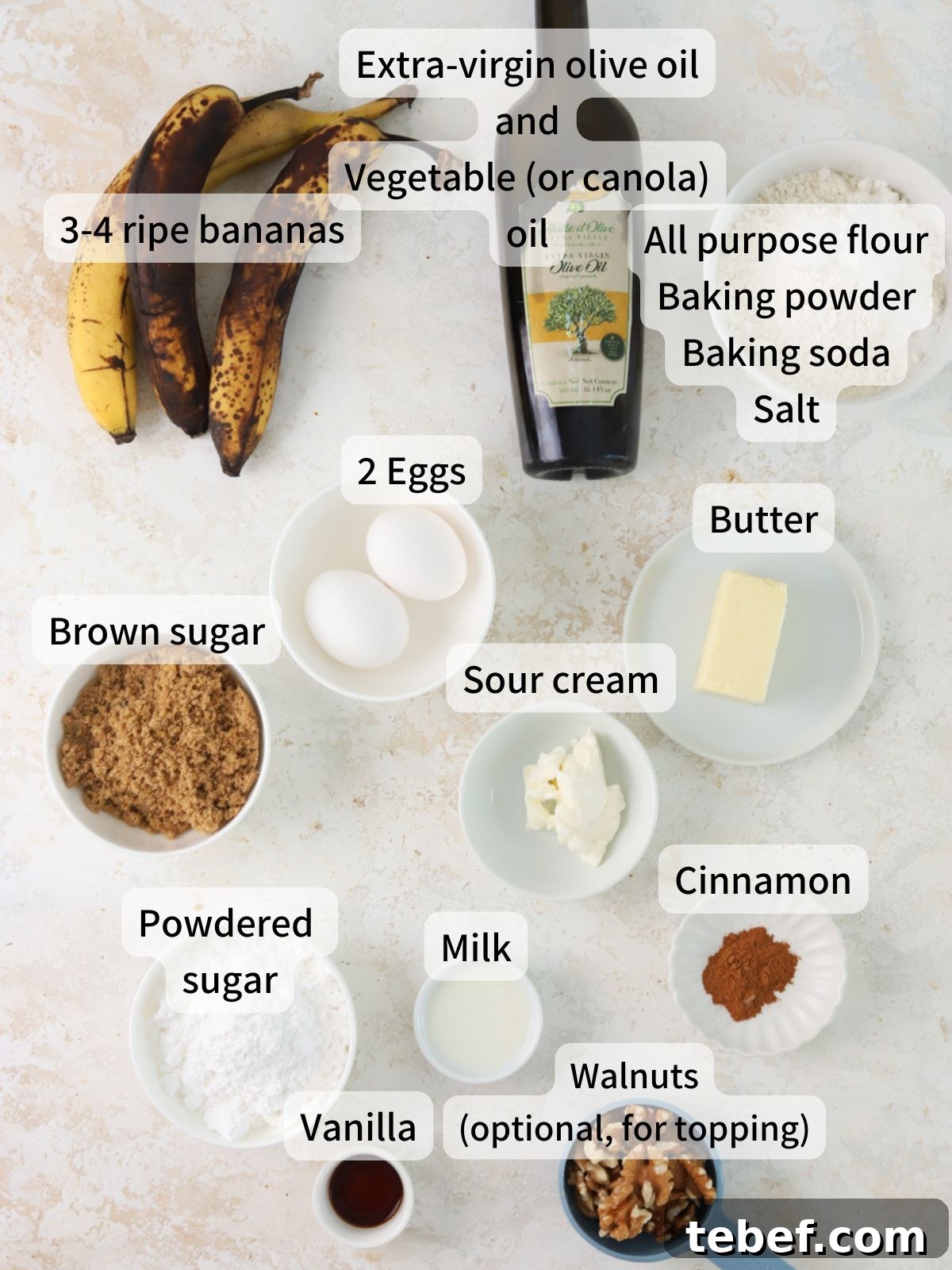 Moist Banana Olive Oil Cake Recipe for Perfect Homemade Dessert 3 Labeled ingredients needed to make banana olive oil cake laid out on a table.