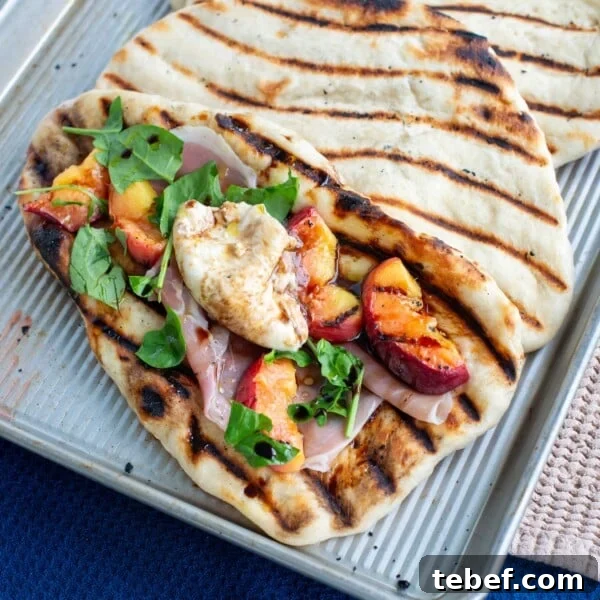How to Bake Frozen Pizza for Crispy, Restaurant-Style Results 13 Grilled sourdough flatbread with grilled peaches, burrata, arugula and prosciutto on a baking sheet.