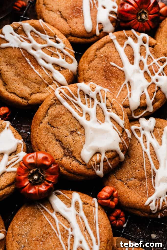 Chewy Pumpkin Cookies with Maple Glaze Recipe 2 Chewy pumpkin cookies with a maple glaze drizzle.