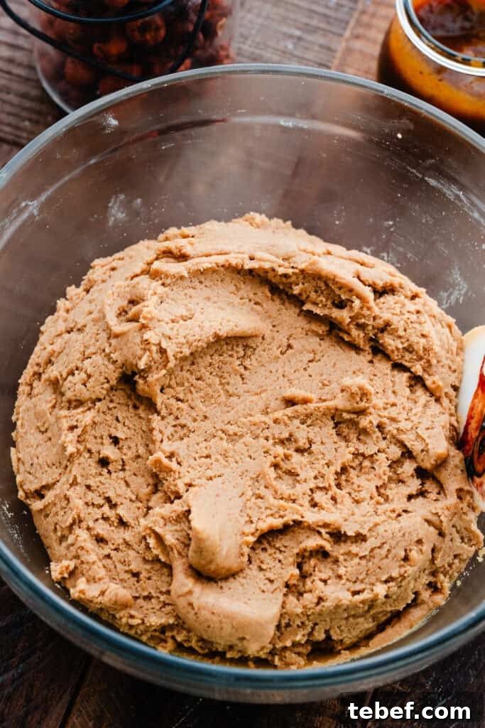Chewy Pumpkin Cookies with Maple Glaze Recipe 6 A bowl of pumpkin cookie dough.