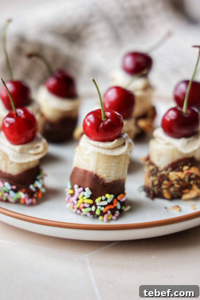 Frozen Banana Split Bites: No-Bake Dessert Recipe for Summer 2 a plate of frozen banana split bites.