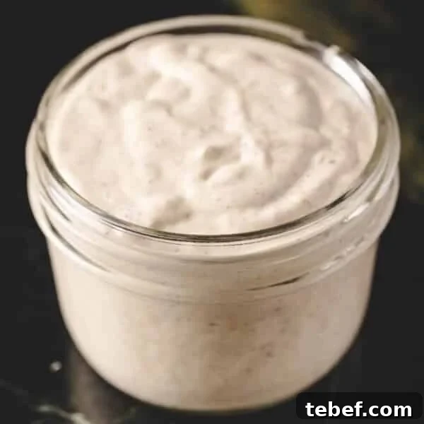 Creamy Dill Tartar Sauce Recipe for Seafood & Sandwiches 6 Creamy horseradish sauce in glass jar.
