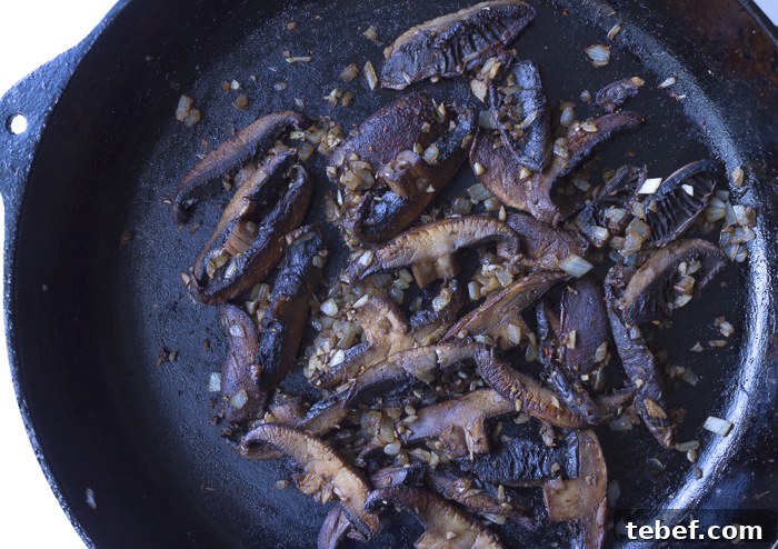 Juicy Grilled Portobello Mushroom Burger Recipe 5 Sauté mushrooms with onions and garlic