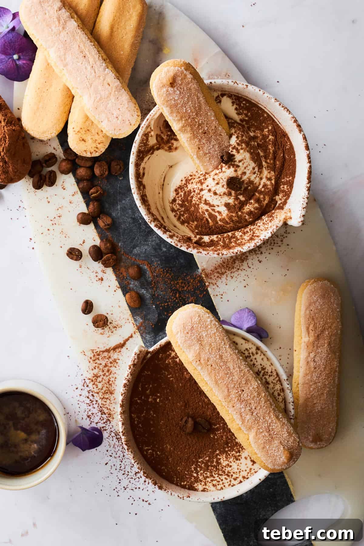 Tiramisu Dessert Dip Recipe for Coffee Lovers 3 Bowls of tiramisu dip with ladyfinger cookies.