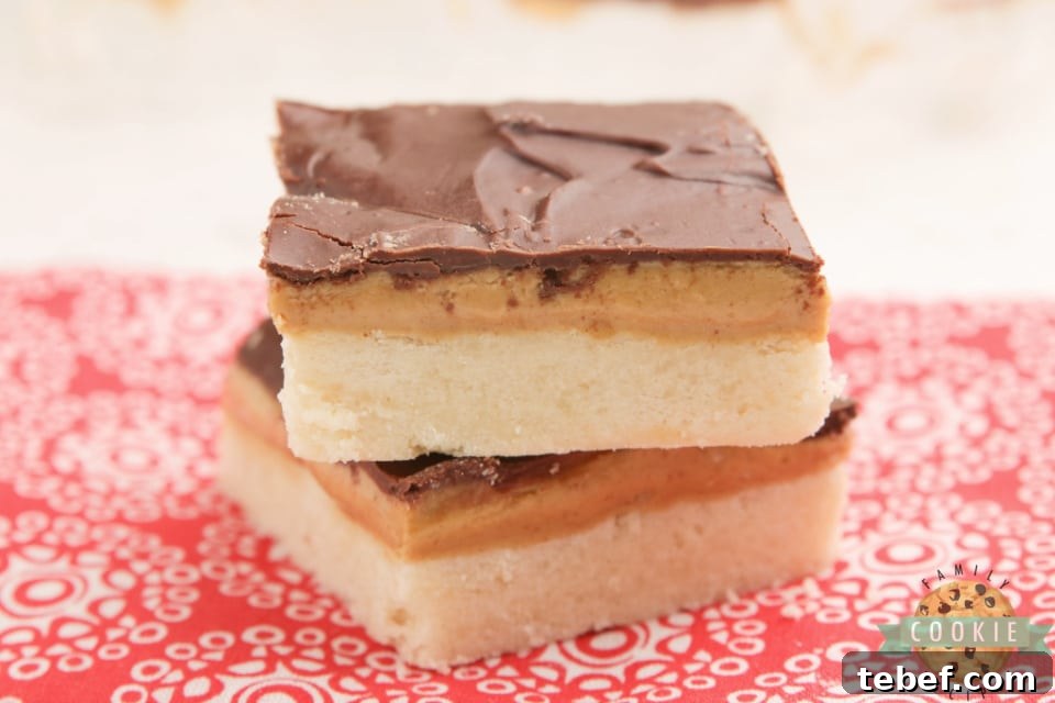 Tagalong Cookie Bars Recipe: Peanut Butter Chocolate Shortbread Bars 6 Tagalong Cookie Bars made with a shortbread cookie crust with a peanut butter layer with chocolate on top.