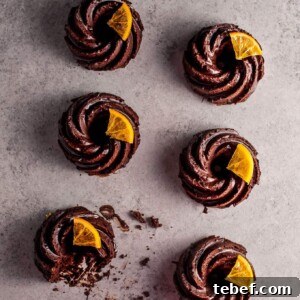 These mini chocolate bundt cakes with candied orange slices are packed full of chocolatey goodness and topped off with a festive touch.