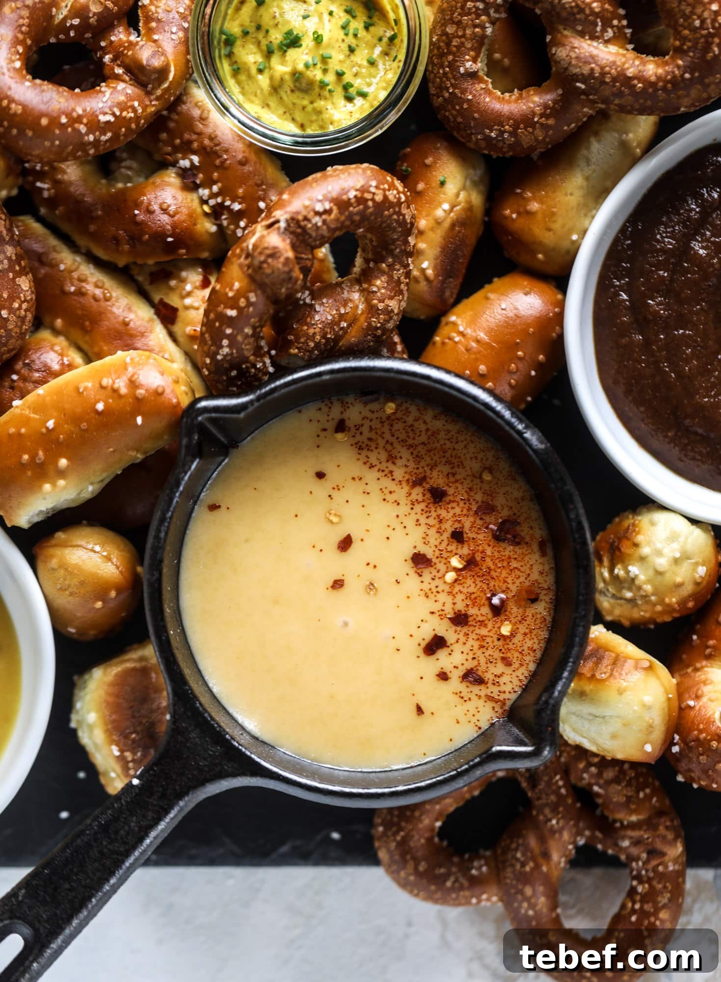 Pumpkin Beer Flight with Hot Pretzel Bar Ideas for Fall Entertaining 5 This is the cutest way ever to serve the best pumpkin beer! If you do a pumpkin beer party of a pumpkin beer tasting, this pumpkin cooler is an adorable (and easy!) way to make things festive. Kick it up with a hot pretzel bar and lots of dipping sauce too! I howsweeteats.com #pumpkin #beer #cooler #softpretzel #fall #cheese