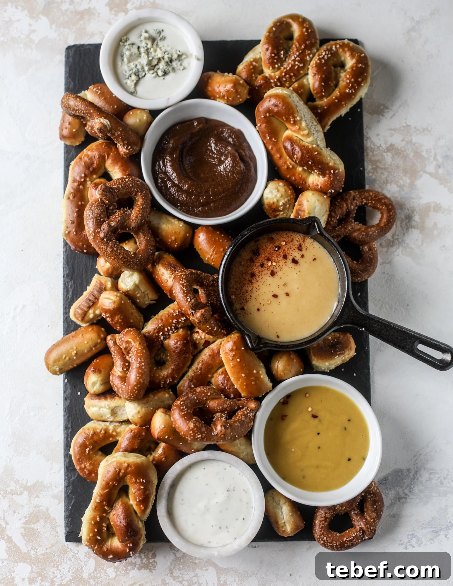 Pumpkin Beer Flight with Hot Pretzel Bar Ideas for Fall Entertaining 7 This is the cutest way ever to serve the best pumpkin beer! If you do a pumpkin beer party of a pumpkin beer tasting, this pumpkin cooler is an adorable (and easy!) way to make things festive. Kick it up with a hot pretzel bar and lots of dipping sauce too! I howsweeteats.com #pumpkin #beer #cooler #softpretzel #fall #cheese