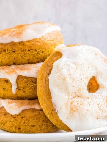 Pumpkin Spice Donuts with Cream Cheese Glaze.