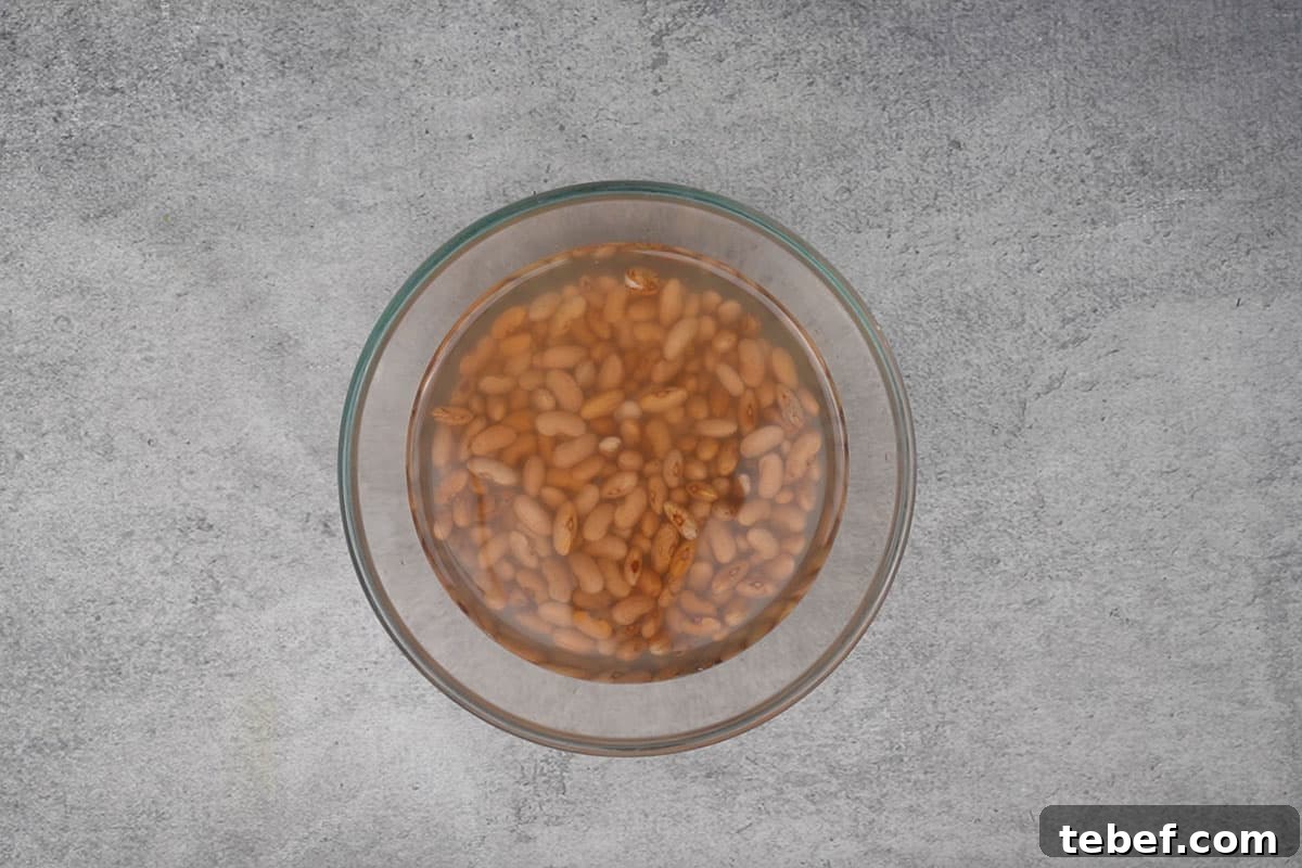 Punjabi Rajma Masala Recipe: Classic Spiced Kidney Beans 5 Rajma soaked in water.