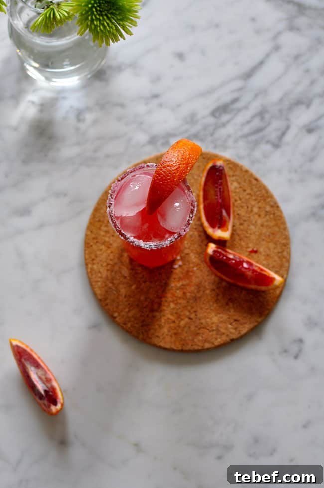 This blood orange salty dog recipe is the perfect pick-me-up cocktail for winter. Fresh blood orange and pink grapefruit juices and vodka; simple and easy! Blood Orange Salty Dog Recipe