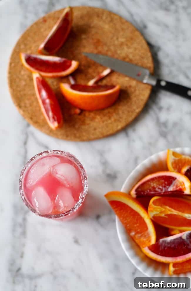 This blood orange salty dog recipe is the perfect pick-me-up cocktail for winter. Fresh blood orange and pink grapefruit juices and vodka; simple and easy! Blood Orange Salty Dog Recipe