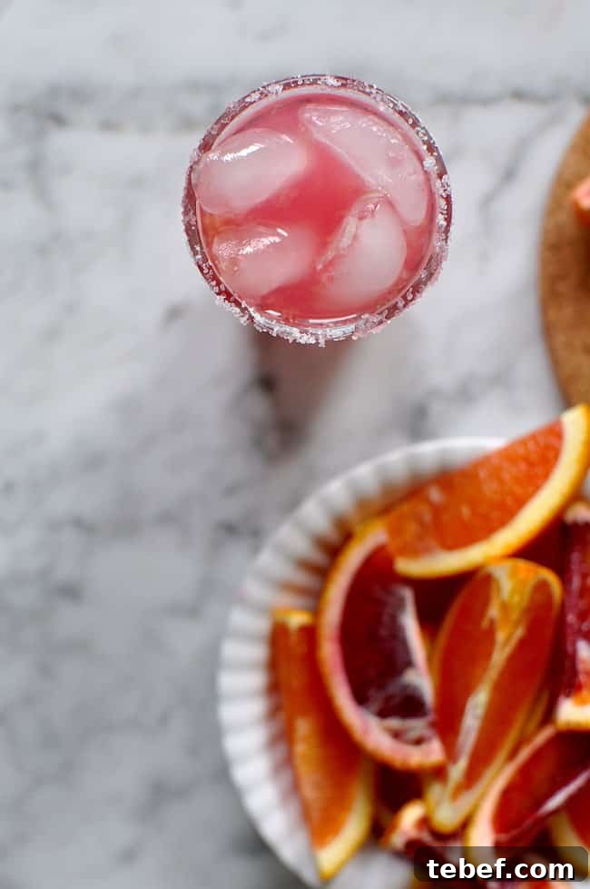 This blood orange salty dog recipe is the perfect pick-me-up cocktail for winter. Fresh blood orange and pink grapefruit juices and vodka; simple and easy! Blood Orange Salty Dog Recipe