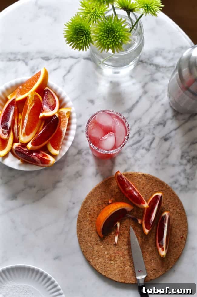 This blood orange salty dog recipe is the perfect pick-me-up cocktail for winter. Fresh blood orange and pink grapefruit juices and vodka; simple and easy! Blood Orange Salty Dog Recipe