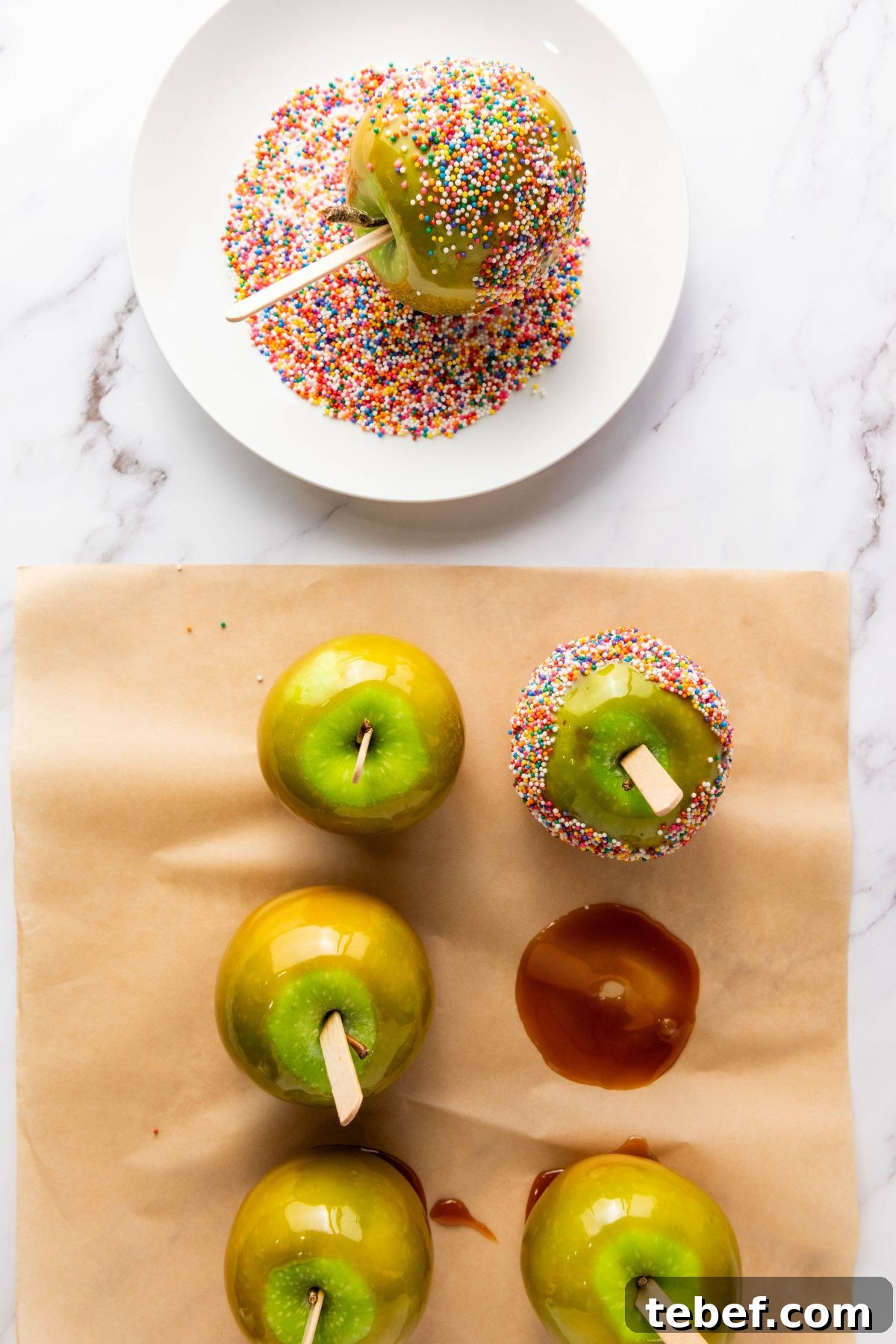 How to Make Classic Caramel Apples at Home in 5 Steps 8 Coated apples that have been dipped in melted sugar, then rolled in sprinkles.
