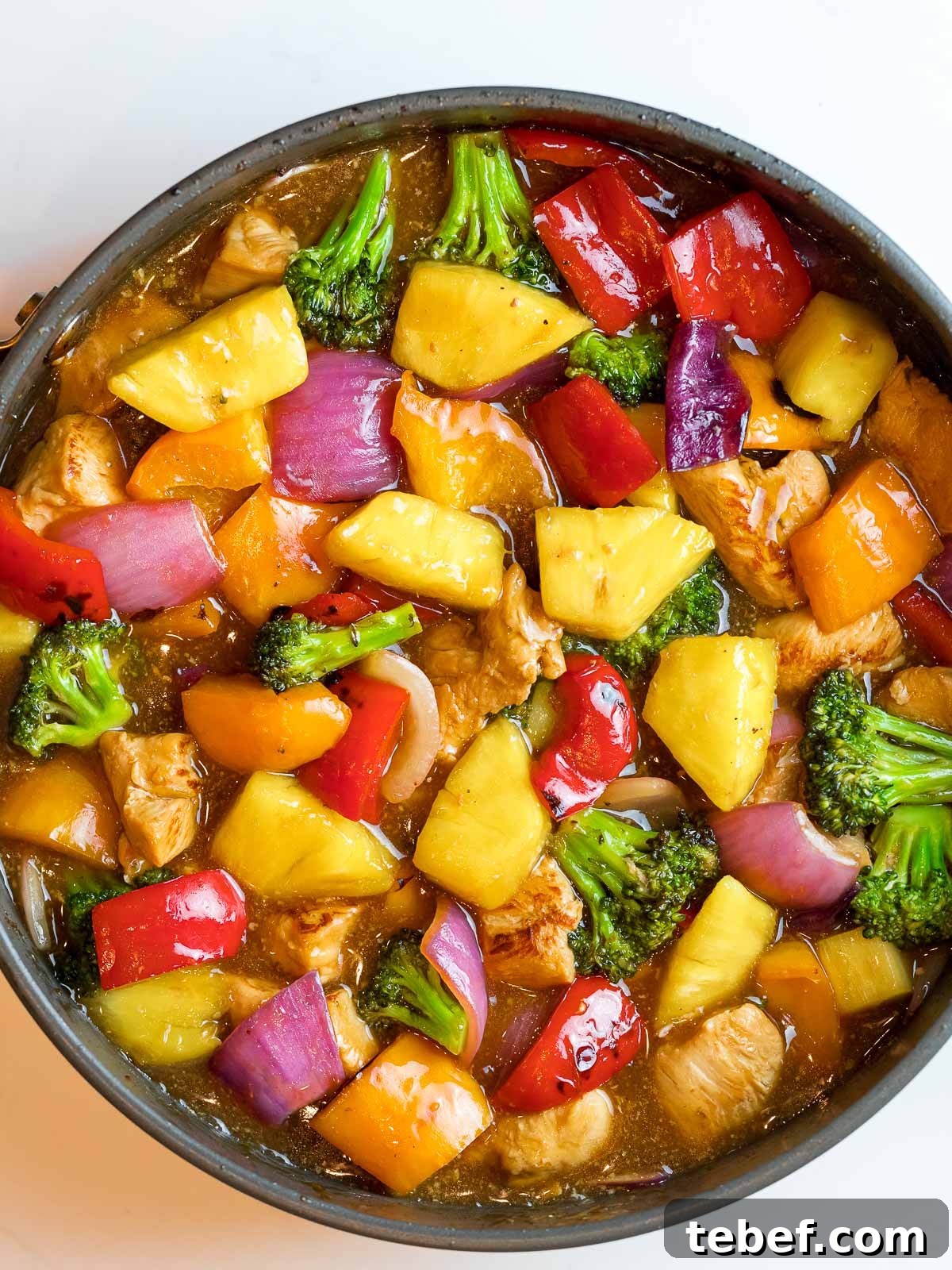 sweet and tangy pineapple chicken stir fry with pineapple teriyaki sauce