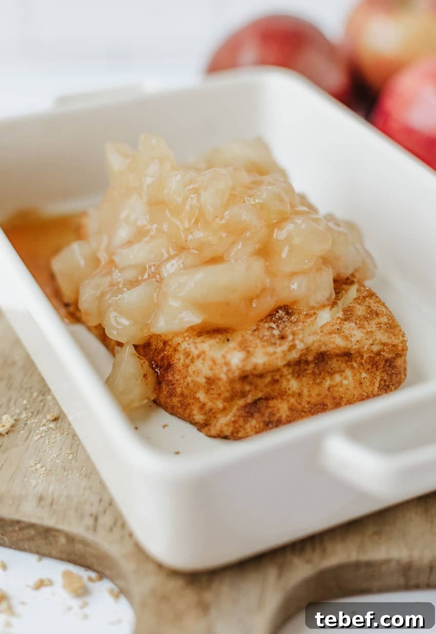 Smoked Cream Cheese with Apple Pie Flavor: Recipe & Tips 8 apple pie filling topped smoked cream cheese in a small white baking dish