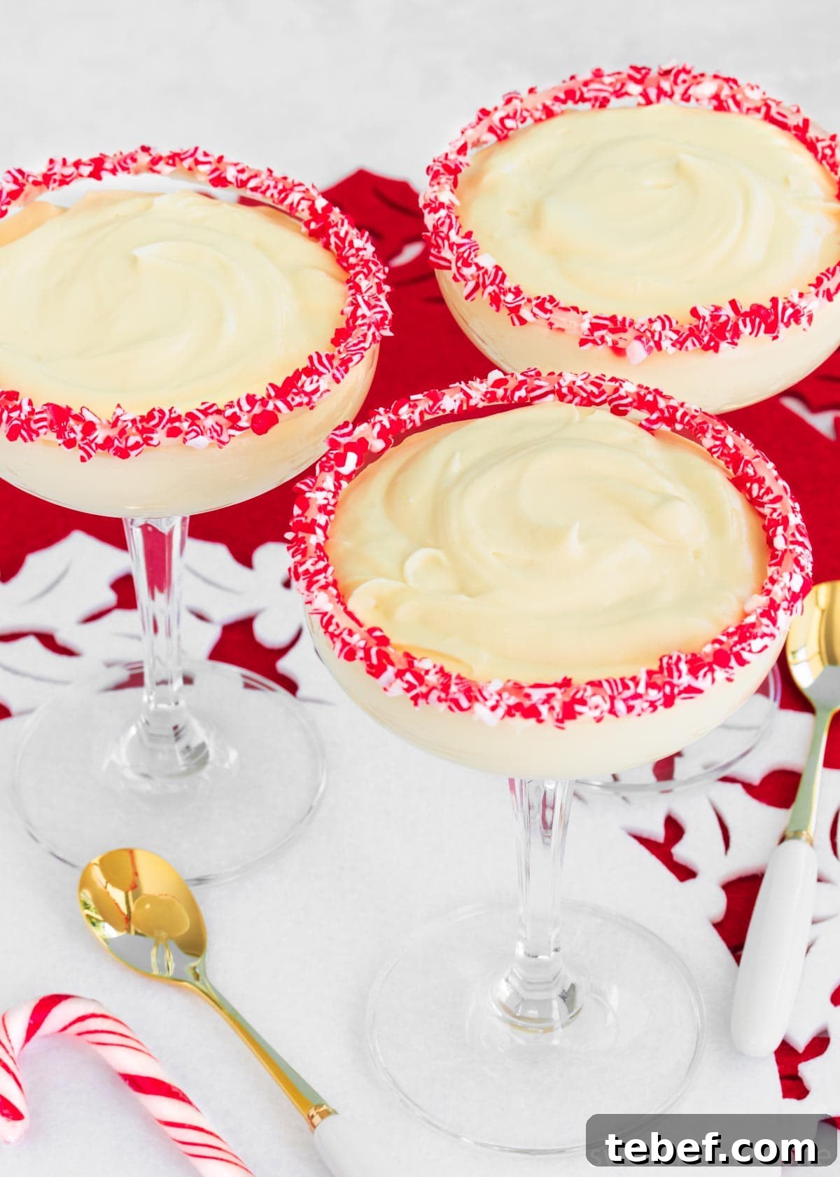 Creamy Peppermint Mousse Recipe for Festive Desserts 4 Three cocktail glasses with mousse.