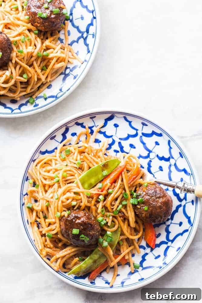 One-Pan Veg Noodles with Manchurian Stir-Fry (Indo-Chinese) 4 one pan veg noodle and manchurian stir fry served in a plate