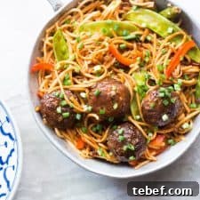 One Pan Veg Noodle and Manchurian Stir Fry served in a pan.