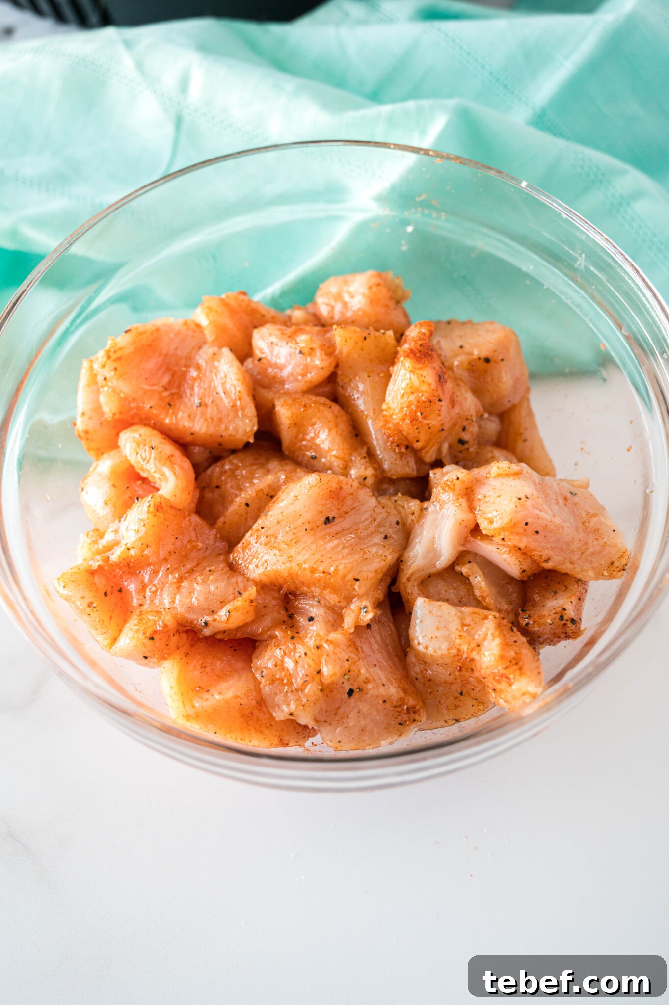 Copycat Chick-fil-A Grilled Nuggets Recipe: How to Make Them at Home 8 raw seasoned chicken pieces in a large bowl