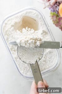 leveling flour with a butter knife