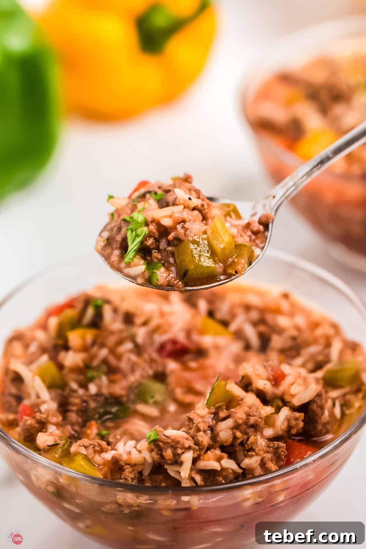 Slow Cooker Stuffed Pepper Soup Recipe for Comforting Weeknights 11 close up of spoon with soup in it