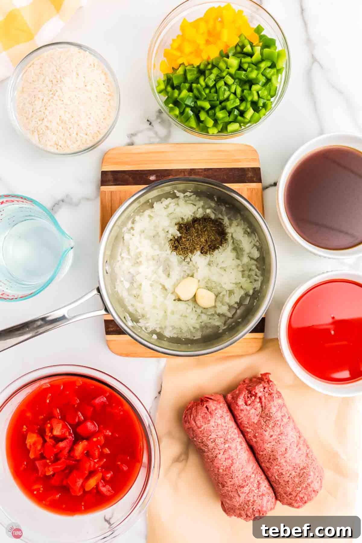 Slow Cooker Stuffed Pepper Soup Recipe for Comforting Weeknights 4 onions, seasoning, and garlic in a pot