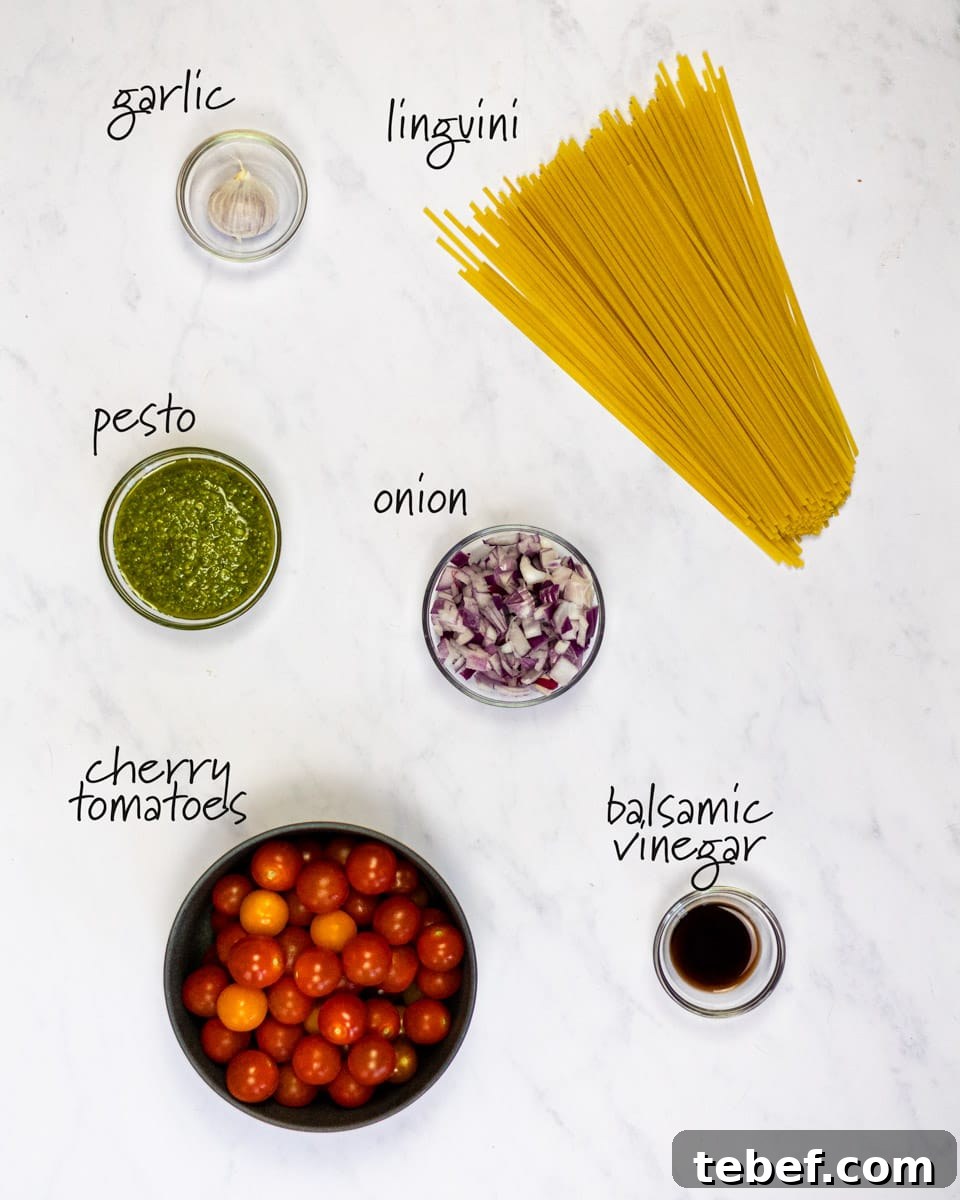 Cherry Tomato and Pesto Pasta Recipe for Quick Weeknight Meals 3 ingredients for cherry tomato pesto pasta with text labels.